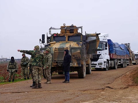 Turkish military vehicles are pictured in the town of Binnish in Syrias northwestern province of Idlib. 
