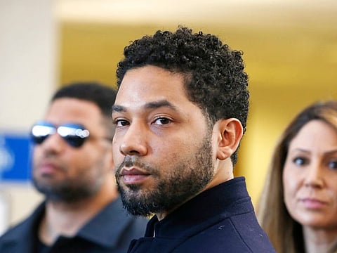 (FILES) In this file photo actor Jussie Smollett after his court appearance at Leighton Courthouse on March 26, 2019 in Chicago, Illinois. Former "Empire" star Jussie Smollett, a US television actor who was accused of fabricating a hate crime, was indicted on six counts related to the incident on February 11, 2020 after all charges against him were dropped last year. / AFP / GETTY IMAGES NORTH AMERICA / NUCCIO DINUZZO
