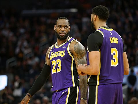 Los Angeles Lakers forward LeBron James (23) talks with centre Anthony Davis