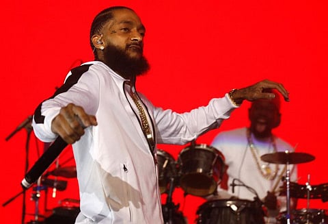 In this file photo, Rapper Nipsey Hussle performs raps from his album, "Victory Lap," along with other songs at the Palladium in Hollywood on Feb. 15, 2018. Hussle, the L.A. rapper and entrepreneur, was murdered outside his Marathon Clothing store in South L.A. (Genaro Molina/Los Angeles Times/TNS)