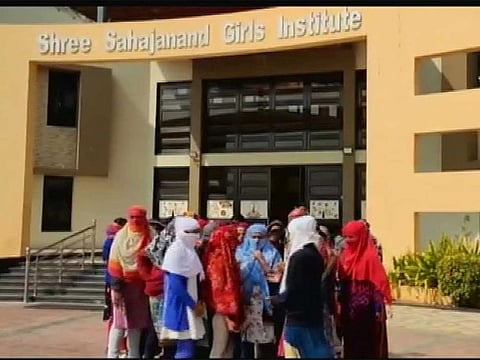 The students were told to undress after a used sanitary napkin was found in a garden outside Sahjanand Girls Institute