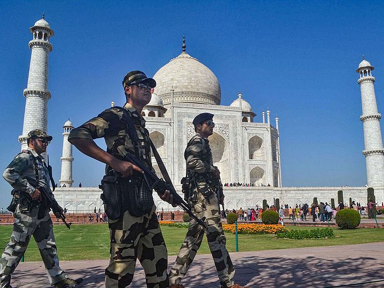 Security personnel patrol the premises of Taj Mahal