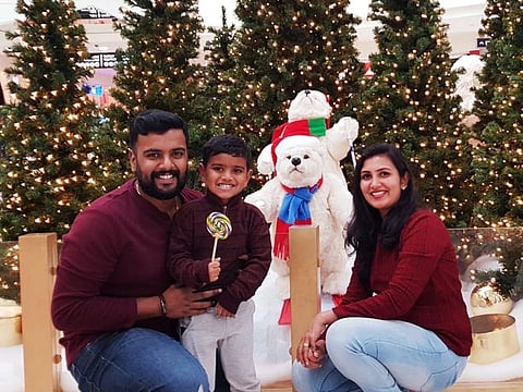 Anil Ninan left with his wife Neenu and their four-year-old son