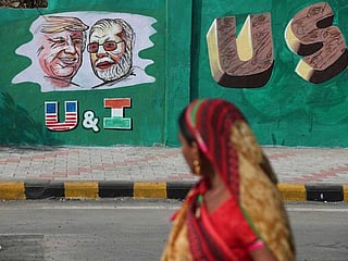 India builds wall along slum ahead of Trump visit