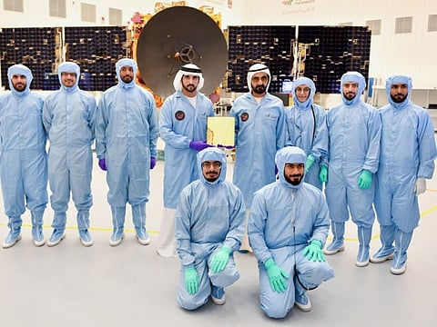 His Highness Sheikh Mohammed bin Rashid Al Maktoum, Vice President and Prime Minister of the UAE and Ruler of Dubai, and Sheikh Hamdan bin Mohammed bin Rashid Al Maktoum, Crown Prince of Dubai and Chairman of Mohammed bin Rashid Space Centre, witness the installation of the last metal piece of the Hope Probe on Tuesday  