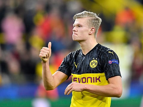 Dortmund's Erling Braut Haaland gives thumbs up at the end of the match.