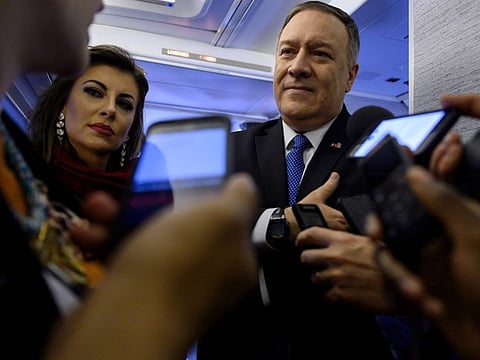 US Secretary of State Mike Pompeo speaks to reporters onboard his plane as he flies from Ethiopia to Saudi Arabia on February 19.