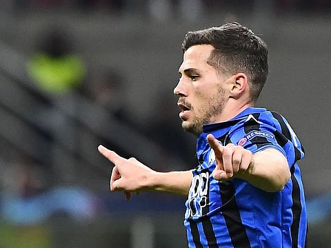 Atalanta's Swiss midfielder Remo Freuler celebrates after scoring.