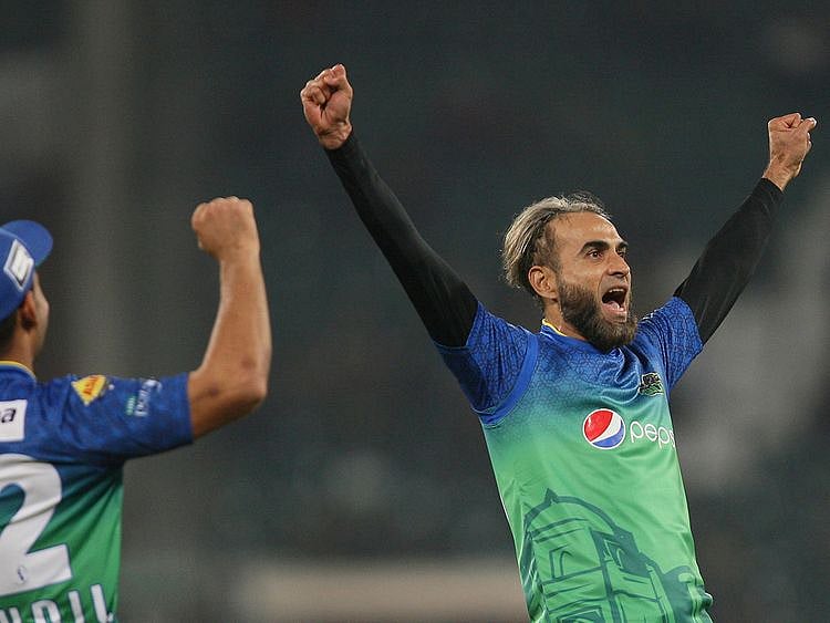 Imran Tahir of Multan Sultans celebrates after claiming the wicket of Lahore Qalandars' Mohammad Hafeez in the Pakistan Super League match in Lahore
