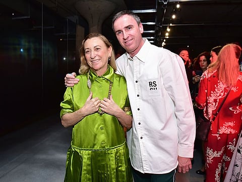 Designer Miuccia Prada and Designer Raf Simons attend the Prada Resort 2019 fashion show on May 4, 2018 in New York City.