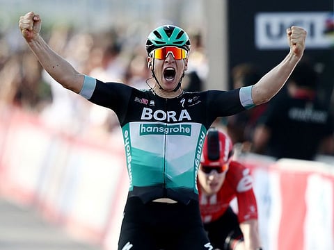 Bora-Hansgrohe's Pascal Ackermann celebrates winning the UAE Tour Stage 1 race.   