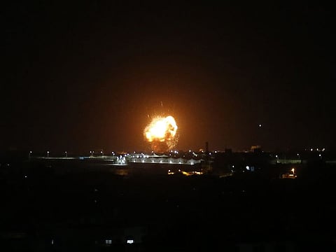 A ball of fire is seen following an Israel airstrike at Rafah in the southern Gaza Strip early on February 23, 2020.