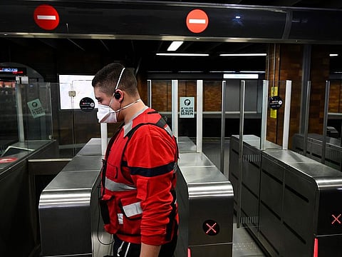 A member of the Fire safety and personal assistance (Service de securite incendie et d'assistance à personnes - SSIAP) patrols at the train and bus station  Lyon Perrache after marking a security zone, following the blockage of a bus coming from Milan due to suspected COVID-19 the novel coronavirus on board, in Lyon, on February 24, 2020.