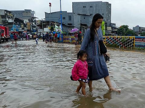 Thousands caught in floods in Indonesia's sinking capital