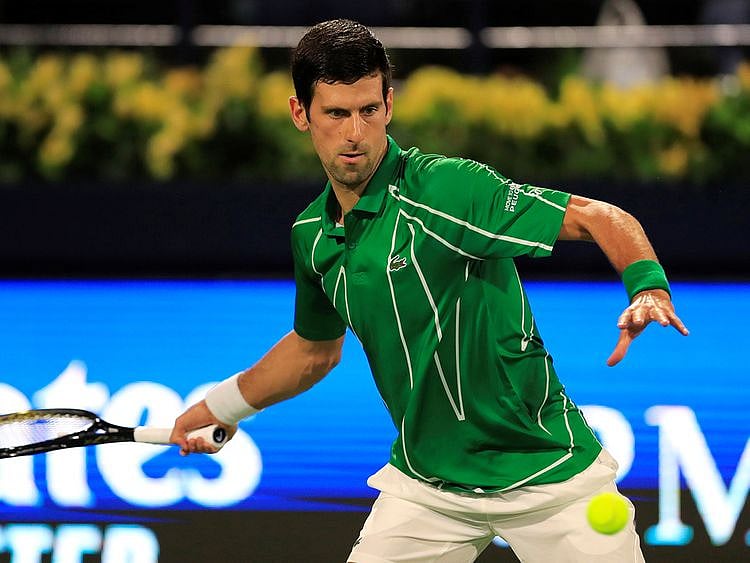 Novak Djokovic in action against Jaziri