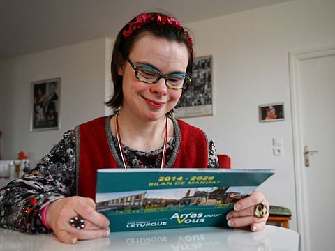Eleonore Laloux, a young woman with Down syndrome, at her home in Arras, northern France, on February 13, 2020. When the mayor of Arras, a town in northern France, asked her to stand as a candidate in upcoming municipal elections, Laloux did not hesitate.