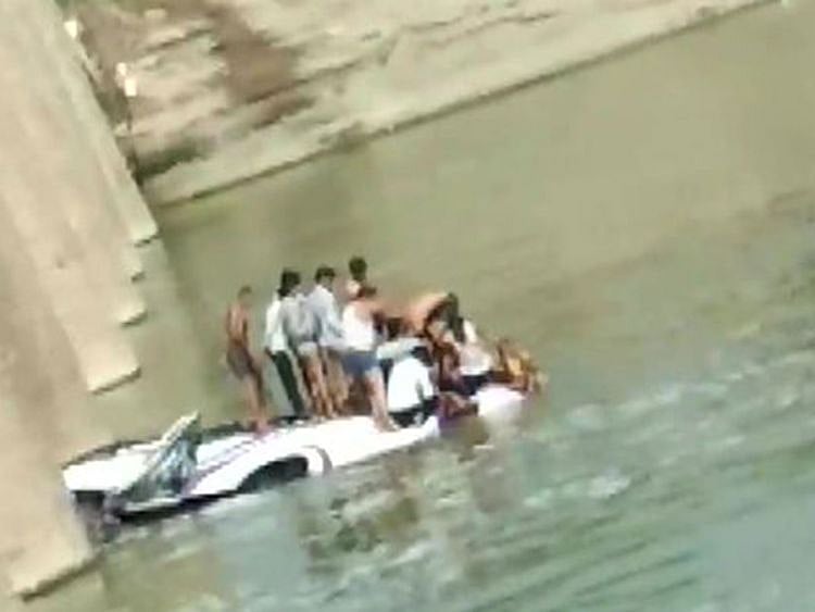 24 dead as wedding bus falls off bridge