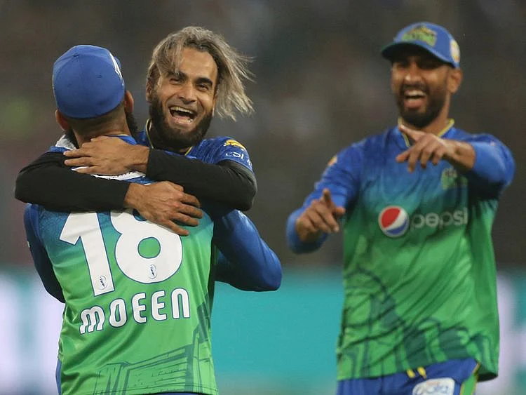 Imran Tahir, center, of Multan Sultan celebrates a dismissal of Karachi Kings' batsman during the Pakistan Super League T20 cricket match in Multan, Pakistan, Friday, Feb. 28, 2020. (AP Photo/K.M. Chaudhry)