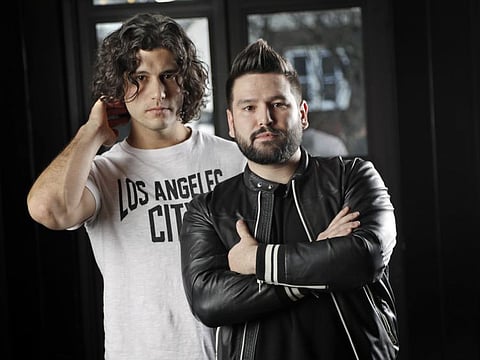 Dan Smyers, left, and Shay Mooney, of the duo Dan + Shay, pose in Nashville, Tenn. In nominations announced Thursday, Feb. 27, 2020, the Grammy-winning duo lead the 2020 Academy of Country Music Awards with six nominations for Smyers and five for Mooney and helped pop star Justin Bieber earn his first-ever ACM noms.