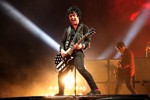 PASADENA, CA -- SEPTEMBER 16, 2017 -- An upbeat Billie Joe Armstrong performs with Green Day at the Rose Bowl on September 16, 2017. (Genaro Molina/Los Angeles Times/TNS)