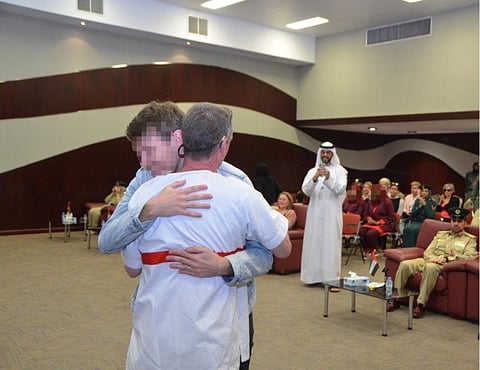 Inmate reunited with his son at an event in Dubai Central Jail 