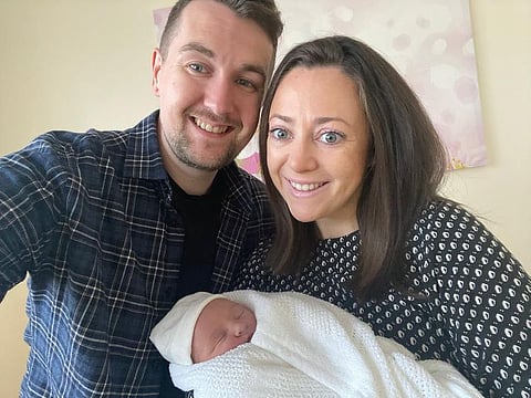 Colin Armstrong, his wife Alison, and their newborn daughter, Isla. Both Alison and Isla are Leap Day babies, born on February 29.