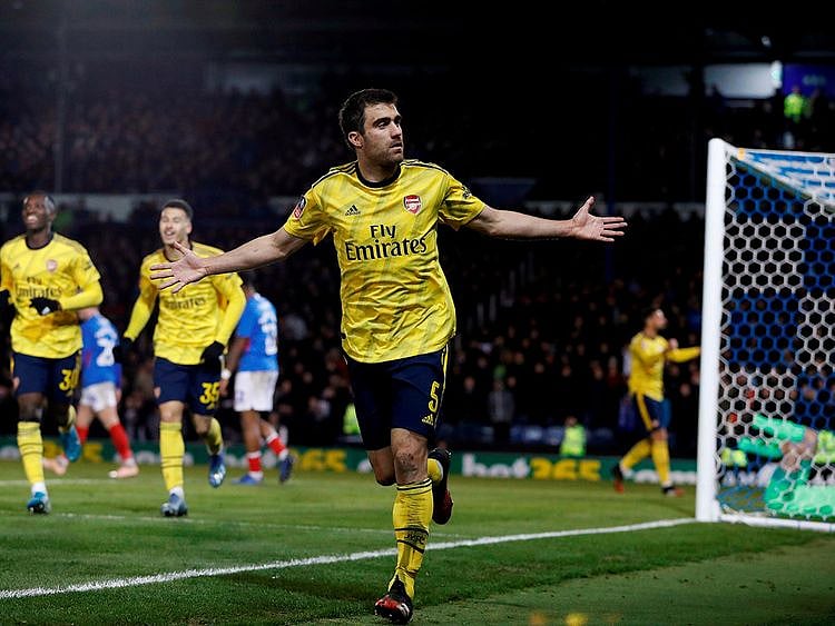 Arsenal's Sokratis Papastathopoulos celebrates scoring their first goal