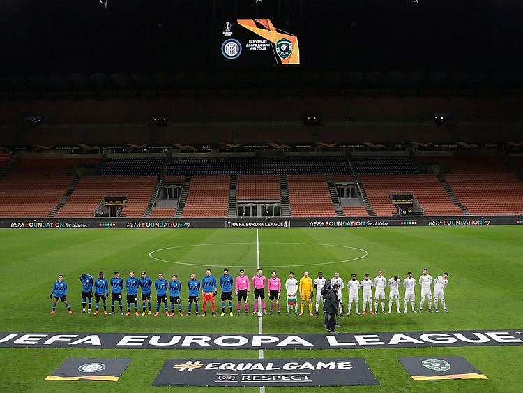 Inter Milan had to play their Europa League match against Ludogorets behind closed doors due to the coronavirusSiro, Milan, Italy - February 27, 2020    The teams line up before the match in an empty stadium after fans were not allowed in over coronavirus fears  Emilio Andreoli/Pool via Reuters