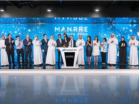 The promoters of Manrre Logistics Fund, including Manohar Lahori, with senior Nasdaq Dubai officials at the listing of the fund. 