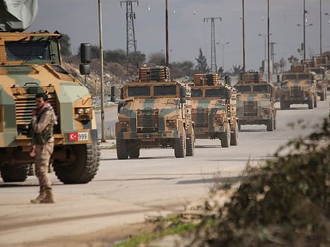 A Turkish military convoy moves in Idlib province, Syria. A summit meeting between the Turkish and Russian leaders scheduled for Thursday, March 5, 2020, may be the last chance to work out a deal that avoids a calamity in Syria's northwest. Faced with mounting losses for his troops in Syria and a potential wave of refugees fleeing fighting in northwestern Syria, Turkish President Recep Tayyip Erdogan is eager for a cease-fire and Vladimir Putin is ready to bargain