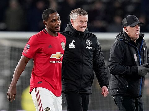 Manchester United manager Ole Gunnar Solskjaer celebrates with Odion Ighalo after the match.