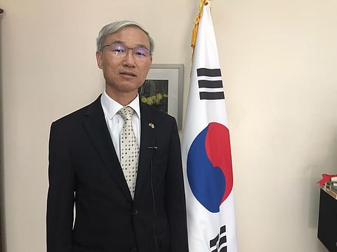 South Korean Consul General Chun Young Wook talking to Gulf New