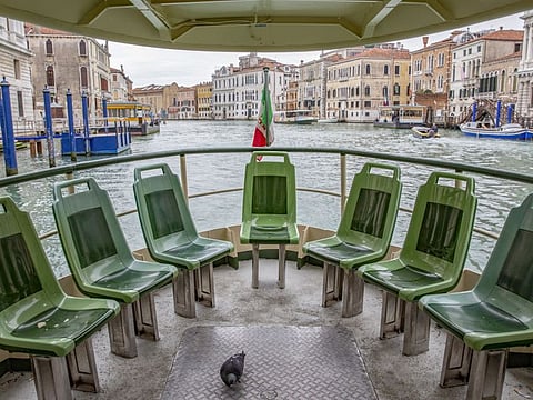 Empty seats on a Vaporetto boat line vessel in Venice, Italy. The coronavirus outbreak has hit particularly hard in Italy, where travel and tourism generate 13% of economic activity.
