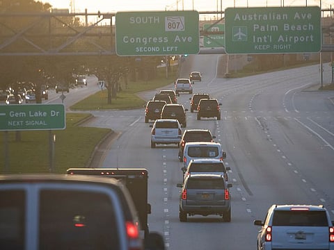The motorcade of President Donald Trump travels to the Trump International Golf Club, Sunday, March 8, 2020, in West Palm Beach, Florida.