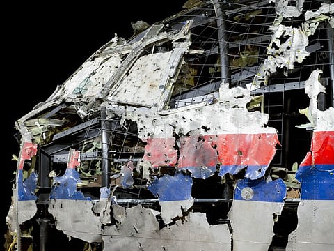 The reconstructed cockpit of Malaysia Airlines Flight MH17 plane is displayed before a news conference by the Dutch Safety Board in Gilze-Rijen, Netherlands  on October 13, 2015. United by grief across oceans and continents, families who lost loved ones when Malaysia Airlines Flight 17 was shot down in 2014 hope that a trial will finally deliver them something that has remained elusive ever since: The truth.