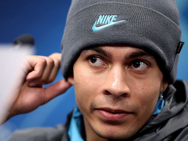 Tottenham's English midfielder Dele Alli listens during a press conference on the eve of the UEFA Champions League football match between Leipzig and Tottenham, in Leipzig