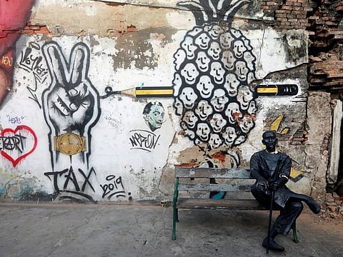 A statue is seen at an empty touristic area, amid fear of coronavirus in Phuket, Thailand on March 10.
