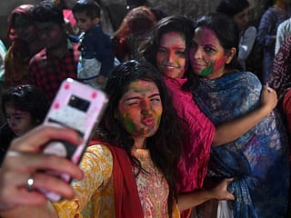 In pictures: Pakistani Hindu community defy coronavirus to celebrate Holi festival across the country 