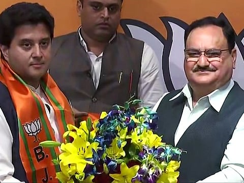 Jyotiraditya Scindia joins the BJP in the presence of BJP President J.P Nadda at BJP headquarters in New Delhi on Wednesday.