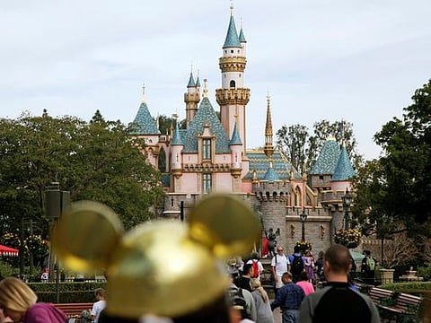 Sleeping Beauty’s Castle in the background at Disneyland Resort in Anaheim, California.