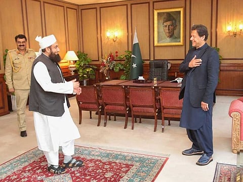 Pakistan Prime Minister avoids handshake with renowned religious scholar Maulana Tariq Jameel as he extends his hand when he calle don the Prime Minister on Monday. Imran avoids handshake to prevent coronavirus spread.