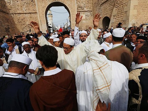Libyan Sufi Muslims chant and beat drums during a procession to commemorate Prophet Mohammad's (PBUH) birthday, also known as Mawlid, in the old city of the Libyan capital Tripoli.