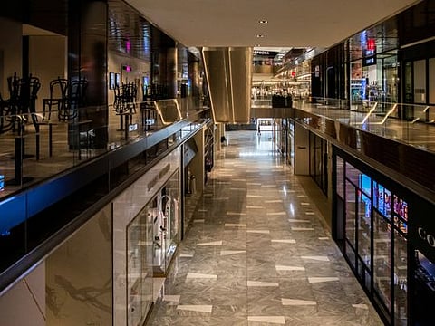 Empty retail stores are seen in the Manhattan borough, following the outbreak of coronavirus (COVID-19), in New York City, on March 15, 2020.