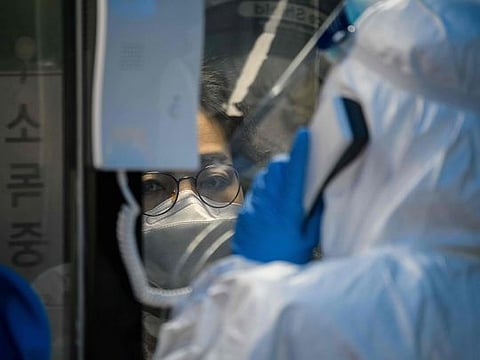 Coronavirus: South Korea dials up virus testing with hospital 'phone booths'