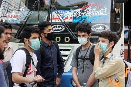 Students wear face masks as a safety precaution against coronavirus.