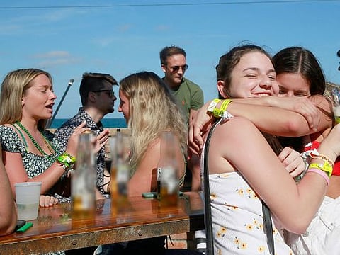 Photos: Spring breakers throng Florida beaches despite coronavirus pandemic