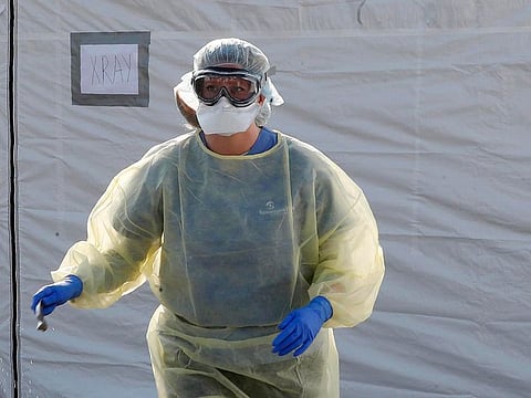 Staff at work at the Samaritan's Purse field hospital that is being set up in Cremona, Italy, Saturday, March 21, 2020.