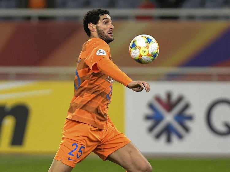 Shandong Luneng's Marouane Fellaini chas tested positive for the coronavirus