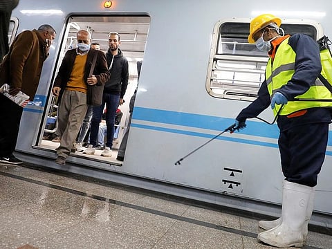 A member of medical team sprays disinfectant as a precautionary move amid concerns over the coronavirus disease (COVID-19) outbreak in Cairo, Egypt (File)
