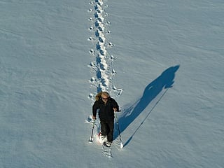 Artist walks 45,000 steps to create massive snow art
